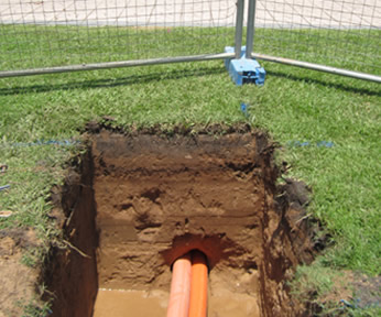 helping darwin electrician runs conduit without digging up driveway 